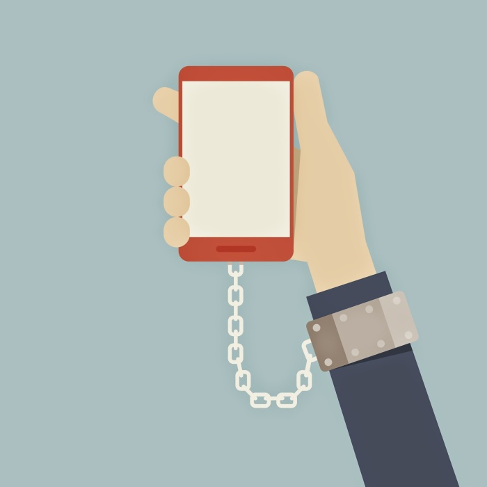 mobile-addiction-phone-chained-IS-181596174.jpg